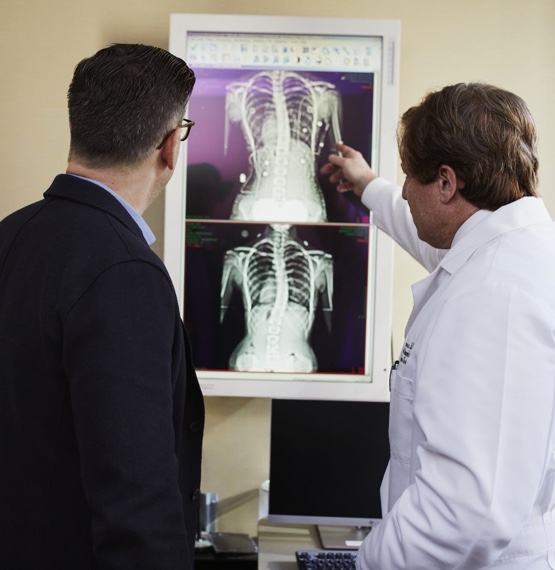 Doctor Showcasing Xray Astrazeneca App